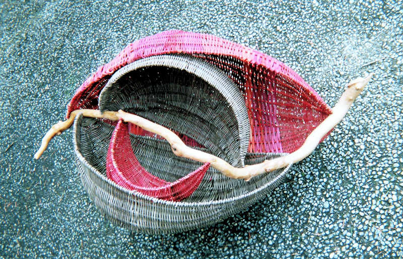 rib basket of dyed reed in nested forms