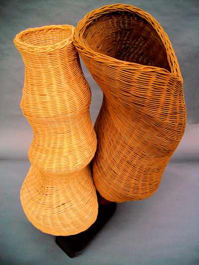 Selves Evident natural and smoked reed baskets sharing a single base